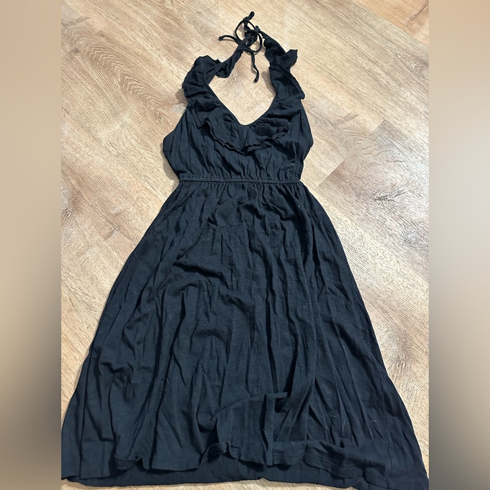 Black halter top dress with ruffles. Gently worn, as is.
